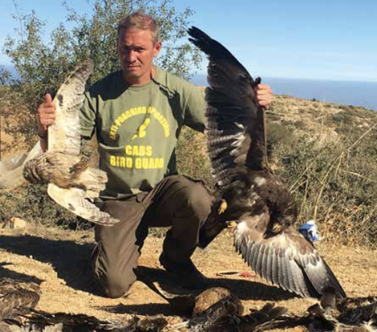 Lloyd Scott amid a raptor massacre © CABS